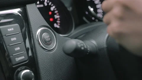 Female Finger Push Start Engine Button on a Car. Women Enjoy Driving and Singing Stock Footage 152050611