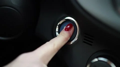 Female finger pushes start button in the car 스톡 동영상 47330465