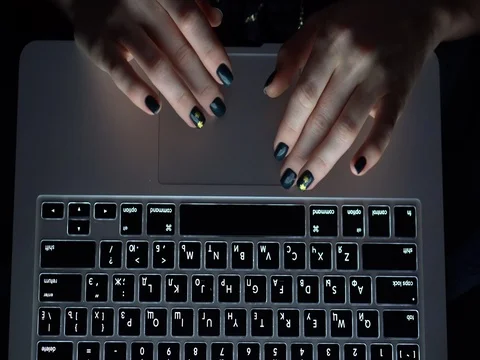 Female fingers touch the laptop's touchpad Stock Footage 80894923