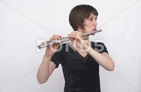 A female flautist Stock Photos