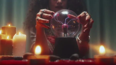 Female Fortune Teller Using Crystal Ball while Trying to Find Answers Stock Footage 253178051