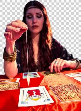 Female fortune teller using pendulum 스톡 사진