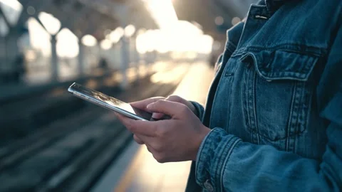 Female freelance worker using smartphone outdoors Stock Footage 195095864