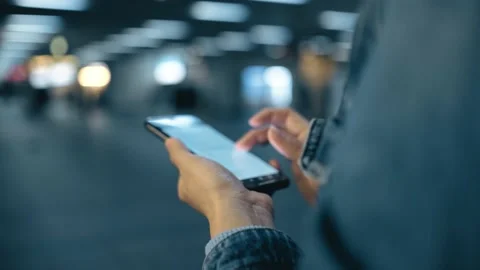 Female freelance worker using smartphone outdoors Stock Footage 195096052