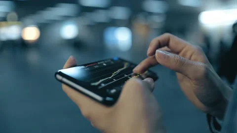 Female freelance worker using smartphone outdoors Stock Footage 195096083