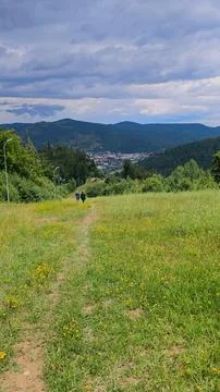 Female friends hiking down a mountain trail in Gura Humorului, Stock Photos