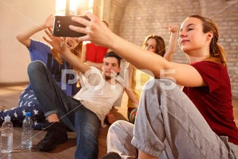 Female with friends making selfie indoor Stock Photos