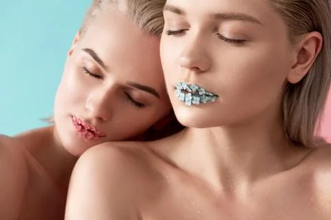 Female friends trying freshness of their skin Stock Photos