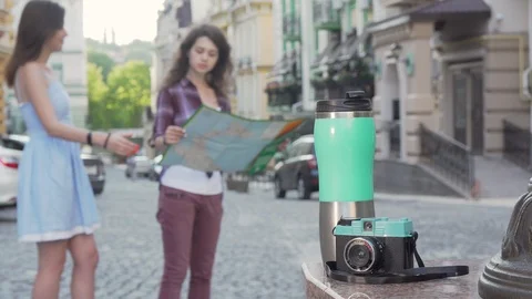 Female friends using a map while travelling together Stock-Footage 115341146