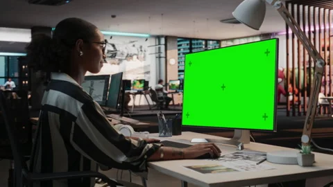 Female Game Developer Using Chromakey Computer In Office Stock Footage 255795515