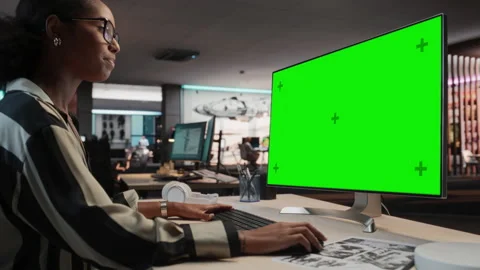 Female Game Developer Using Chromakey Computer In Office Stock Footage 255795588