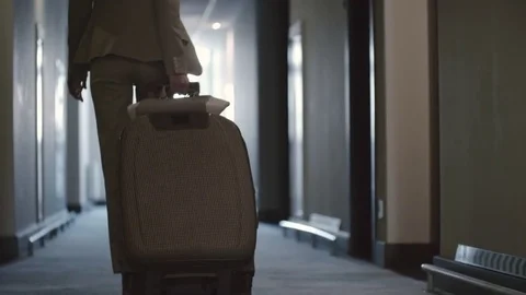 Female Guest Walking Into Hotel Room Stock Footage