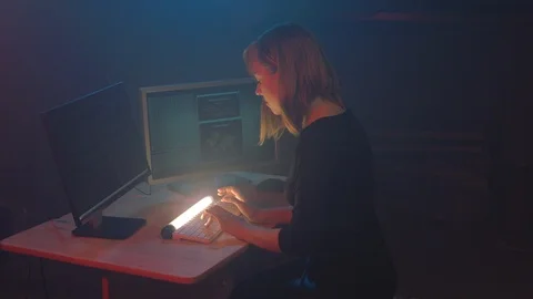 Female Hacker programmer is working in a high tech industry. Stock Footage 89746163