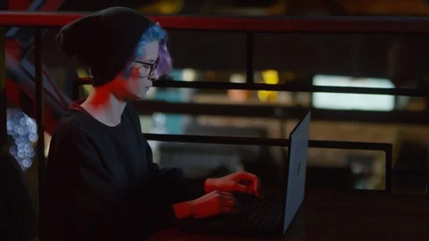 Female Hacker Programming in Café Stock Footage 105290971