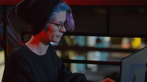 Female Hacker Using Laptop in Café Stock Footage 105291824