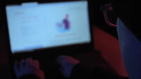 Female Hacker Using Laptop Over Shoulder 2 Stock Footage 154260627