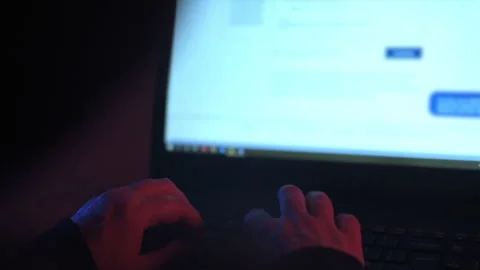 Female Hacker Using Laptop Over the Shoulder 2.1 Stock Footage 154262318