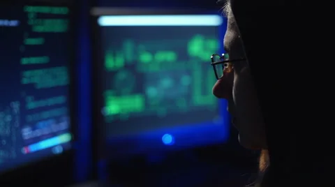 Female hacker works at the computer Stock Footage 60851742