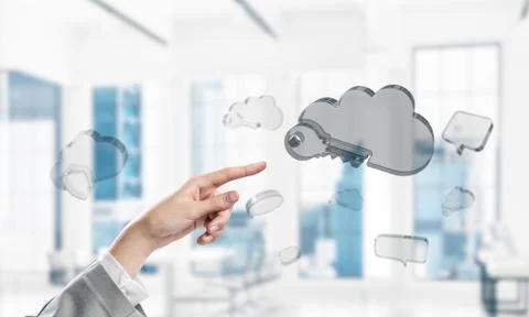 Female hand and cloud computing concept in modern interior. Mixe 写真素材