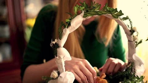 Female hand arranging easter basket traditionally brought to church to be blesse Stock Footage 104030766