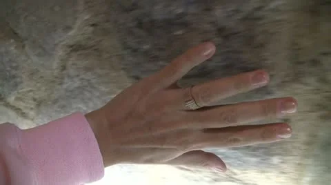 Female Hand Brushes Wall 動画素材 12360320
