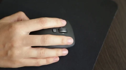 Female hand on computer mouse Stock Footage 103532640