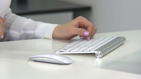 Female hand computer mouse with keyboard Stock Footage 70545955
