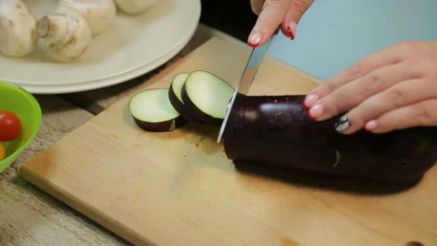 Male Hands Slicing Eggplant Knife Wooden Board Stock Photo by