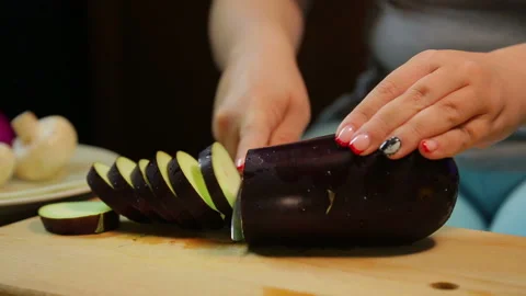 Male Hands Slicing Eggplant Knife Wooden Board Stock Photo by