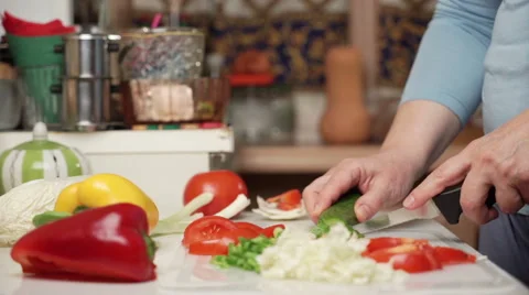 Female hand cutting vegetables Stock Footage 48339529