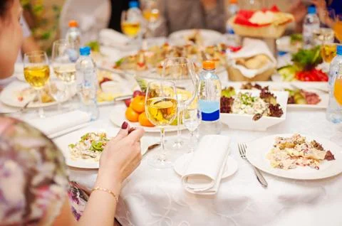Female hand with a dinner Stock Photos