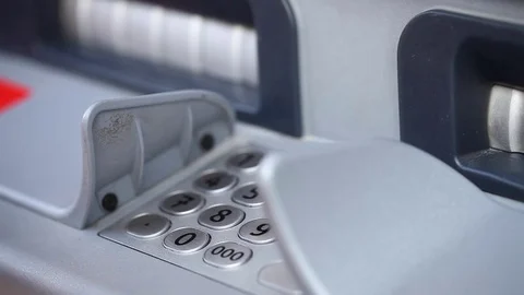 Female hand entering PIN code at an ATM Stock Footage 69887730
