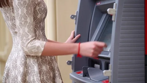 Female hand entering PIN code at an ATM Stock Footage 70113350