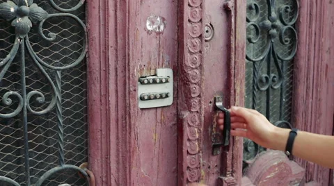 Female hand entering the secret code on the old door Stock Footage 67230774