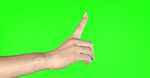 Female hand gestures on green screen: pointing Stock Footage 84520563