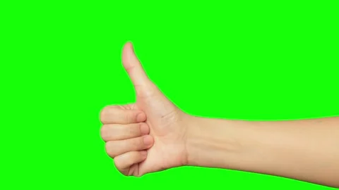 Female hand on green background Stock Footage 224431470