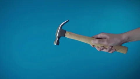 A female hand hammers Stock Footage 85322387
