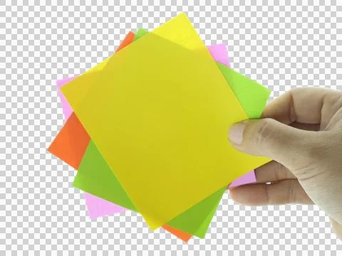 Female hand holding blank note paper isolated on transparent background. Stock Photos
