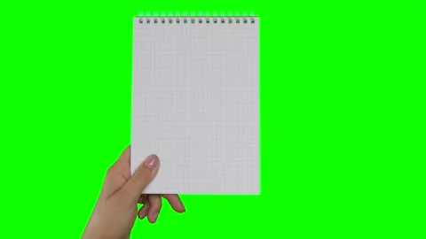 Female Hand Holding Notepad with blank Page Isolated On Green Chroma Key Video stock 248625370