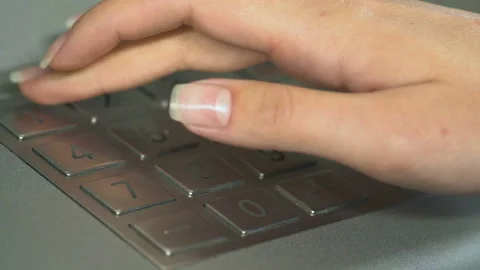 Female hand inserting pin code to check balance on bank account, ATM, banking Stock Footage 92602673