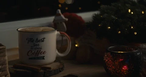Female hand inserting a straw in a beverage in a cozy Christmas atmosphere. Stock Footage 120026647