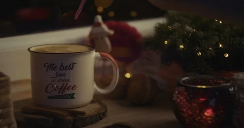 Female hand inserting a straw in a beverage in a cozy Christmas atmosphere. Stock Footage 120026648