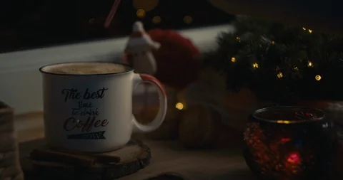 Female hand inserting a straw in a beverage in a cozy Christmas atmosphere. Stock Footage 120026765