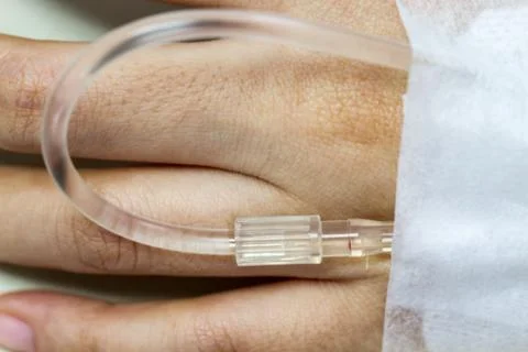 Female hand with iv solution Stock-Fotos