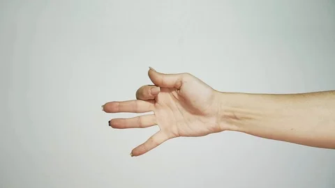 Female hand learns to make gestures Stock Footage 103428756