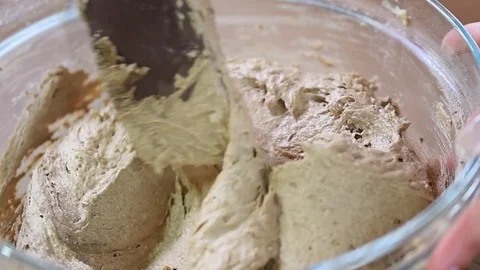 Female hand mixing with a spatula chocolate cream Stock Footage