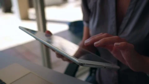 Female hand navigates tablet close up Stock Footage 88466840