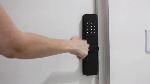 Female hand opening a door using a card access on digital lock. Video stock 324592493
