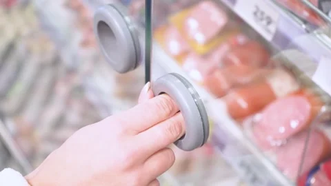 Female hand opens refrigerator compartment Stock Footage 264015230