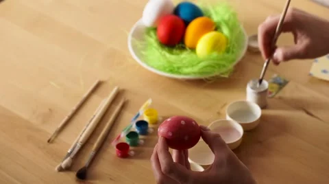Female Hand Painted Easter Eggs with a Brush Stock Footage 61743440
